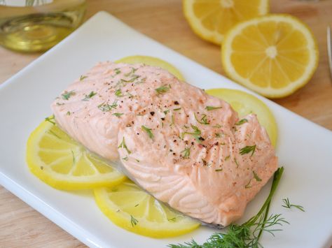 Learn to easily poach salmon with wine and herbs using this guide from Food.com. Salmon In A Pouch Recipes, Poach Salmon Recipes, Pouch Salmon Recipes, How To Poach Salmon, Poaching Salmon, Poached Salmon With Dill Sauce, Wine Poached Salmon, Poach Salmon, Salmon Poached