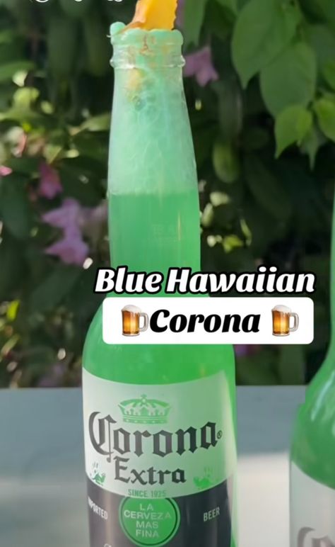 2oz White Rum ~ 2oz Pineapple juice ~ 1oz Blue curaco ~ 1oz cream de coconut blended and then poured into half a bottle of corona Corona Beer Cocktails, Mexican Drink Recipes, Drinks Recipe, Alcholic Drinks, Cocktail Drinks Alcoholic, Mexican Drinks, Cocktail Ideas, Gin Drinks, Yummy Alcoholic Drinks