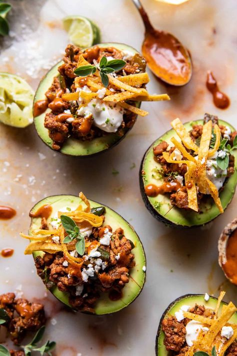 Taco Stuffed Avocados with Chipotle Sauce and Cilantro Lime Ranch...everyone loves a loaded taco...a loaded taco avocado will make your night. Cilantro Lime Ranch, Chili Spice Mix, Cilantro Garlic Sauce, Stuffed Avocados, Half Baked Harvest Recipes, Homemade Tortilla Chips, Chili Spices, Mexican Meals, Refreshing Beverages