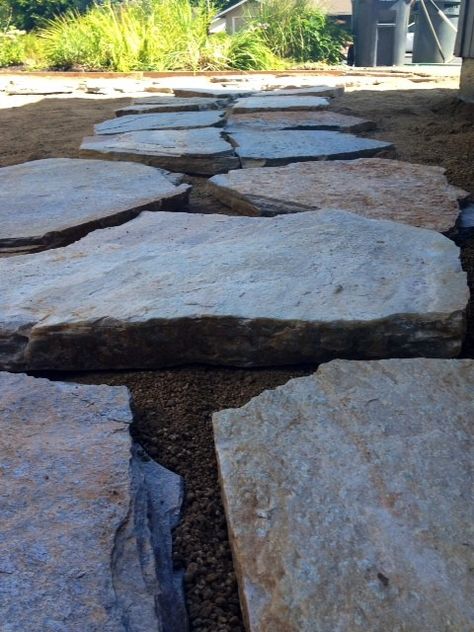 DIY Lowes Flagstone Courtyard Home Improvement Flagstone Courtyard, Landscaping 101, Flagstone Steps, Stone Pathways, Flagstone Pathway, Courtyard Home, Stepping Stone Walkways, Gravel Walkway, Flagstone Pavers