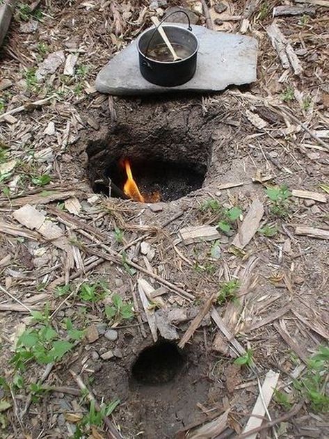 Ever wanted to make your own rocket stove? If you would like to know how you can make your own, today we are bringing you the wonderful selection of DIY rocket stoves. Here are 10 great rocket stoves you can DIY.... Dakota Fire Hole, Dakota Fire, Permaculture Design, Apocalypse Survival, Rocket Stoves, Open Fire, Emergency Prepping, Survival Food, Wilderness Survival