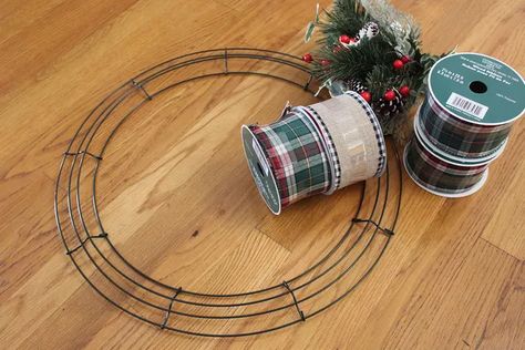 How to Make a Ribbon Wreath | eHow 3 Ribbon Wreath Diy, Round Wire Wreath Ideas, Wide Ribbon Crafts Ideas, Wire Ribbon Wreath Diy, Ribbon Wreaths Diy, Christmas Wire Wreath, Wire Wreath Ideas, Wire Wreath Diy, Make A Ribbon Wreath