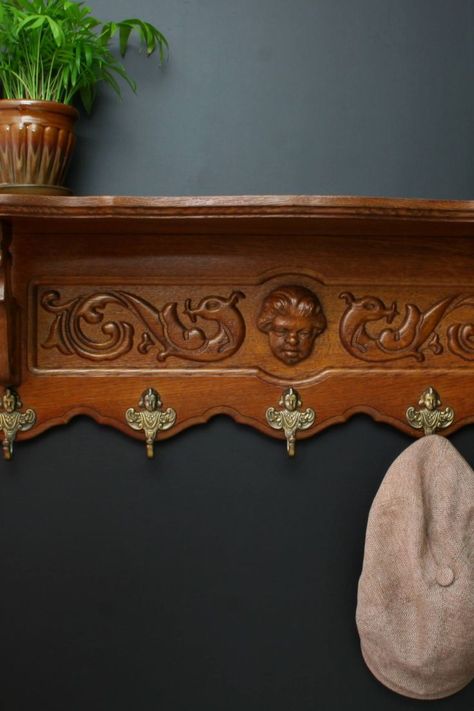 Beautiful vintage wall coat rack with shelf from Belgium. This vintage coat rack is solid wood and beautifully carved with a stunning cherub in the center and 5 solid brass cherub hooks. Antique Coat Rack, Industrial Coat Rack, Coat Rack With Shelf, Wall Shelf With Hooks, Entryway Coat Rack, Rustic Coat Rack, Vintage Coat Rack, Wall Coat Rack, Coat Rack Shelf