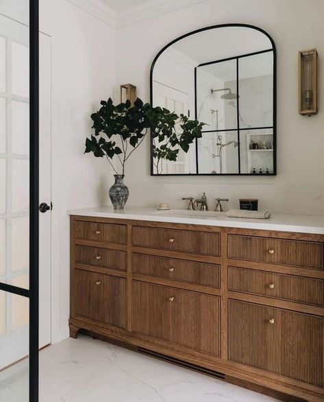 a beautiful stained reeded vanity with a stone countertop and copper knobs, an arched mirror and some greenery is a chic idea Wood Bathroom Vanity, Wooden Vanity, Bathroom Design Inspiration, Wooden Bathroom, Vanity Countertop, Primary Bathroom, Primary Bath, Wood Vanity, Wood Bathroom