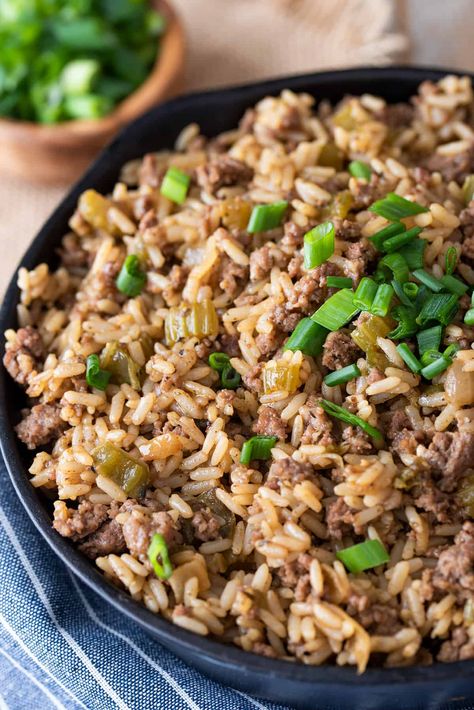 Indulge in the rich flavors of a Cajun classic recipe with this Old-Fashioned Dirty Rice. True Louisiana cuisine in one pot cooking. Serve as a side dish or with gumbo. Cajun Dressing Recipe, Louisiana Dirty Rice Recipe, Cajun Dressing, Louisiana Dirty Rice, Cajun Rice Dressing, Honey Teriyaki Chicken, Cajun Rice, Dirty Rice Recipe, Rice Dressing