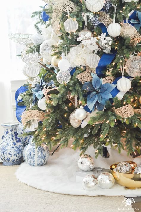 blue-white-and-gold-christmas-tree-with-fur-skirt Ideas Decoracion Navidad, Blue Christmas Tree Decorations, White Christmas Tree Ideas, Blue Christmas Decor, Silver Christmas Decorations, Blue Christmas Tree, Silver Christmas Tree, Gold Christmas Decorations, White Christmas Trees