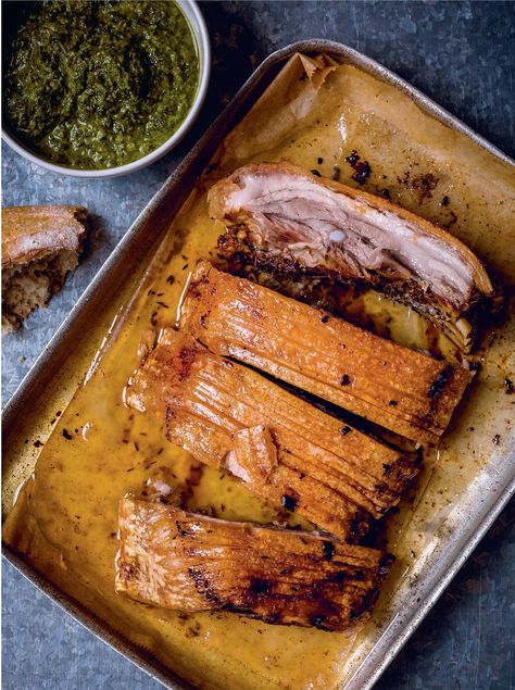 Roasted Pork Belly served with lumpy Mojo Verde is a vibrant and fresh recipe from Nieves Barragán Mohacho’s Sabor cookbook. Serve this Spanish green sauce lumpy with pork belly or smooth to marinate chicken or dunk fresh bread. Revamp your Sunday roast or impress dinner party guests with this succulent Spanish pork belly recipe. Christmas Pork Roast, Spanish Pork, Mojo Verde, Spanish Dinner, Traditional Spanish Recipes, Christmas Roast, Chorizo And Potato, Dinner Party Dishes, Verde Recipe