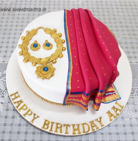 Maharashtrian Pathani saree and Indian jewellery theme cake by Sweet Mantra - Customized 3D cakes Designer Wedding/Engagement cakes in Pune - http://cakesdecor.com/cakes/332037-maharashtrian-pathani-saree-and-indian-jewellery-theme-cake Paithani Cake Design, Pathani Saree, Saree Cake, Marriage Cake, Customised Cakes, Indian Cake, Makeup Cake, Guitar Cake, Birthday Cake For Mom