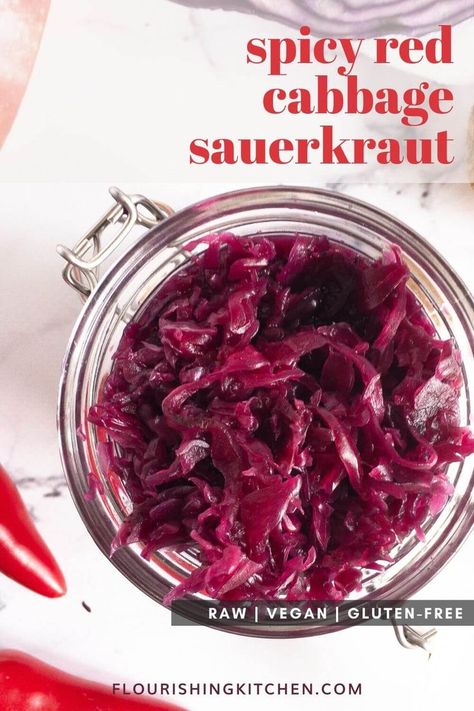 A raw vegan spicy red cabbage sauerkraut made with apple, ginger and red chilli. Easy-to-make Raw fermented food recipes. Delicious tangy cultured sauerkraut made by you. Checkout the recipe. #flourishingkitchen #RawFermentedFood #RawFoodDiet Red Sauerkraut Recipes, Fermented Purple Cabbage, Purple Cabbage Sauerkraut, Red Cabbage Fermented Recipes, Red Cabbage Sauerkraut Recipes, Fermented Red Cabbage Recipe, Canning Red Cabbage Recipes, Fermented Cabbage Recipe, Fermented Red Cabbage