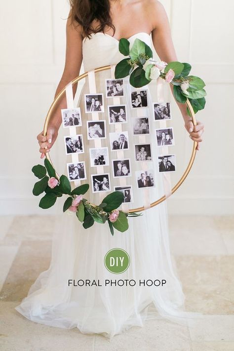 A hula hoop wreath is easy to make and elegant, too, if you paint it gold and use ribbon, greenery and flowers to decorate. Link to DIY Diy Photo Display, Dollar Tree Wedding, Wedding Photo Display, Boda Diy, Rustic Wedding Decorations, Diy Event, Floral Photo, Diy Photo, Photo Craft