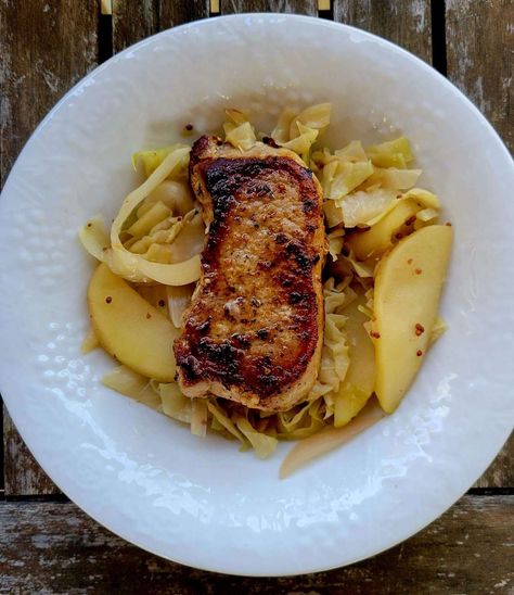 SEARED PORK CHOPS WITH APPLE AND CABBAGE Pork Chops Cabbage And Apples, Pork Chops With Cabbage, Pork Chops And Cabbage Recipes, Pork Chops And Cabbage, Paleo Pork Chop Recipes, Apples And Cabbage Recipe, Paleo Pork Chops, Kaleb Wyse, Pork Chops With Apples