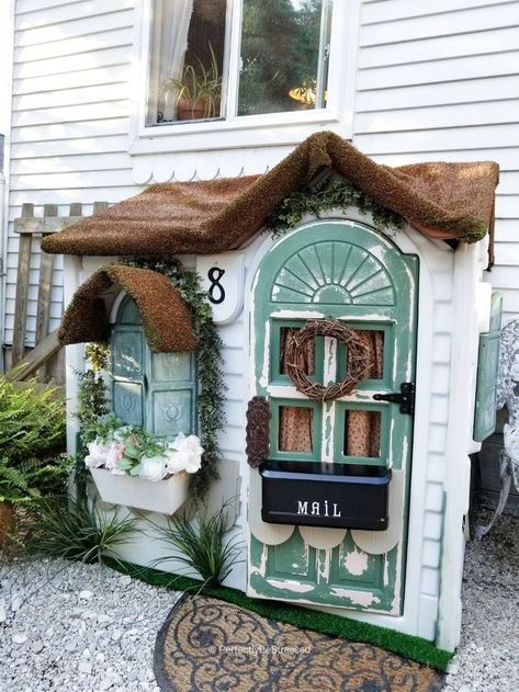 Cozy Cottage Playhouse Upcycle. After a good (and I mean really, really good) scrubbing, I took a tired, old plastic playhouse and transformed it into the sweetest little English Cottage-Style Playhouse you ever did see. Complete with a faux thatched roof! Seriously people - it has a thatched roof!!!    I mean, if this cottage isn't fit for a "Princess Fairy Goddess Queen", I sure the heck don't know what is!    Here's where we started. This house has been with us for almost 13 years. Abandon House, Cottage Playhouse, Plastic Playhouse, Wooden Ironing Board, Distressing Painted Wood, Mud Kitchens, Playhouse Ideas, Fairy Goddess, Diy Playhouse