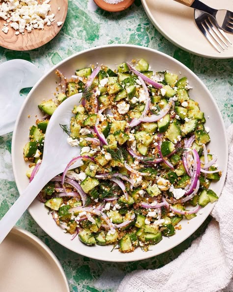 A bowl of the cucumber salad with crunchy quinoa, siting on a countertop with a serving spoon resting in the bowl Cucumber Salad With Crispy Quinoa, Crunchy Quinoa, Greek Chicken Marinade, Crispy Quinoa, Summertime Salads, Fresh Salad, Lemon Vinaigrette, White Bean Soup, Lunch Salads