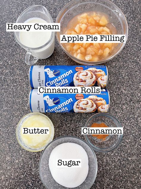 Enjoy a simple and delicious Apple Cinnamon Roll Bake made with pre-made cinnamon roll dough and apple pie filling, perfect for a cozy breakfast or dessert. Cinnamon With Apple Pie Filling, Recipes With Cinnamon Rolls In A Can And Apples, Granny Smith Apples And Crescent Rolls, Fried Apple Cinnamon Roll Bake, Cinnamon Roll Apple Crockpot, Cinnamon Roll Apple Pies, Pie Filling And Cinnamon Rolls, What To Do With Pillsbury Cinnamon Rolls, Grand Cinnamon Rolls And Apple Pie Filling