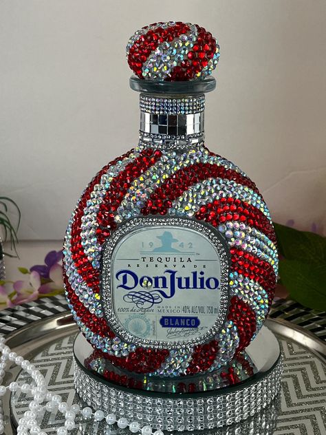 Bling!! Bedazzled Rhinestone Don J Tequila Decanter Bottle.  Beautiful Designed Rhinestone Don J Tequila Liquor Bottle.  Designed in a swirl design with Red/Ab crystal rhinestones.  This 750 ml size decanter comes empty and it's up to you to fill it up!! Definately catches your eye!! Would be a Beautiful Bottle to display with your other decanters! Or a Wonderful Gift! Stop by and see all my other great bling items! Thank you! Badazzel Bottle, Badazzel Liquor Bottles, Rhinestone Bottle Alcohol, Decorating Alcohol Bottles, Decorating Liquor Bottles, Rhinestone Liquor Bottles, Bedazzled Lighter Diy, Liquor Bottle Design, Bling Bottles Liquor Diy