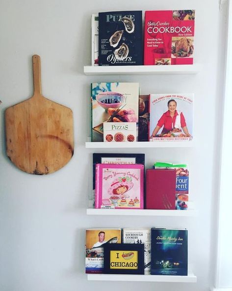 20 ways to display books in your kitchen, including on these minimalist ledges. Kitchen Cookbook Shelf, How To Decorate Kitchen Shelves, Cookbook Display, Kitchen Bookshelf, Cookbook Storage, Cookbook Shelf, Picture Ledge Shelf, Virginia House, Kitchen Cookbook