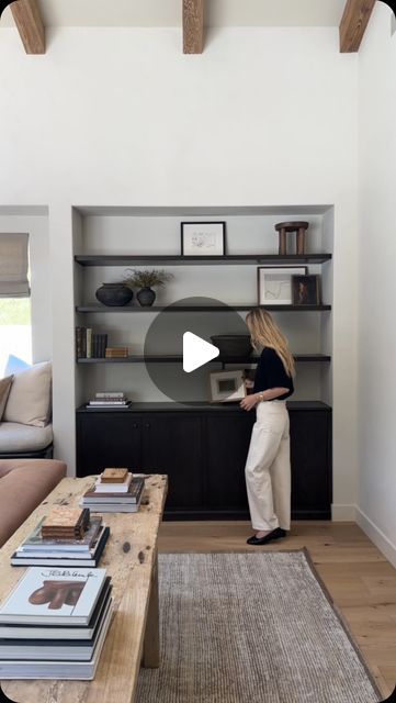 Amber Lewis on Instagram: "Annnnd I’ve still got it, folks!! The team captured me styling up a shelf over at #clientnotoncebuttwice and it is just one of my fave ways to clear my head. There is a loooot going on during project install weeks and many, many moving parts. Sometimes getting back to the basics is what it takes to remind me how damn thankful I am that I get to do what I love with some of the best humans around!! Plus, there is always time for a lil’ shelfie or two IMHO…" Entryway Bookshelf, Bush House, Amber Lewis, Bookshelf Styling, House Accessories, Be A Nice Human, Living Room Style, A Shelf, What It Takes