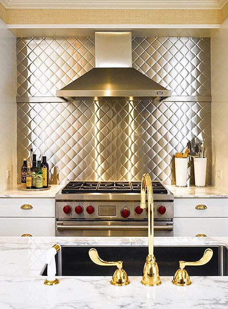 "Quilted" stainless steel diamond patterned backsplash from Traditional Home Stainless Steel Kitchen Backsplash, Paint Cabinets White, Stainless Steel Backsplash, Unique Kitchen Backsplash, Steel Backsplash, Farmhouse Backsplash, Unique Backsplash, Stainless Backsplash, Brass Kitchen