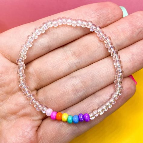 LGBTQAI Subtle Pride Bracelet W Rainbow & Clear Seed Beads on - Etsy Small Bead Bracelet, Pride Bracelet, Bead Charms Diy, Diy Bracelet Designs, Rainbow Bracelet, Jewelry Accessories Ideas, Handmade Fashion Jewelry, Jewelry Beaded, Rainbow Beads