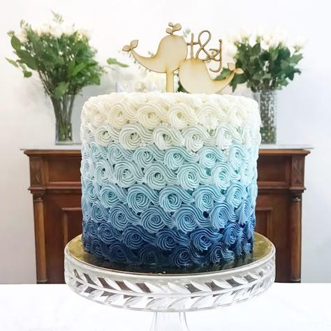 Blue Rosette Cake Ombre, Nautical Buttercream Cake, Blue Ombre Buttercream Cake, Blue Frosted Cake, Simple Ocean Cake, Buttercream Waves On Cake, Waves On Cake, Blue Ombre Cake Birthdays, Ocean Themed Cakes