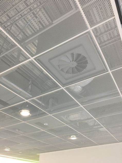 Open Ceiling Design Office, Perforated Ceiling Design, White Mesh Ceiling, Act Ceiling Design, Mesh Ceiling Design, Retail Ceiling Design, Arch Ceiling Design, Grid Ceiling Design, Industrial Ceiling Design