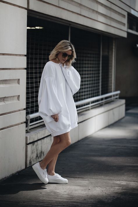 oversized sweatshirt dress + sneakers | @urbanoutfitters Hoodie Dress Outfit, Oversized Hoodie Outfit, Sweatshirt Dress Outfit, Oversized Hoodie Dress, Oversize Outfit, Hoodie Sweatshirt Dress, Woman In White, Oversized Outfit, Balloon Sleeve Dress