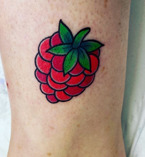 #raspberry #raspberrytattoo #ankletattoo #colourtattoo #fruittattoo #smalltattoo #girltattoo Traditional Raspberry Tattoo, Small Colour Tattoo, Raspberry Tattoo, October Tattoo, Tattoo Fillers, Filler Tattoos, Hexagon Tattoo, Strawberry Tattoo, Fruit Tattoo