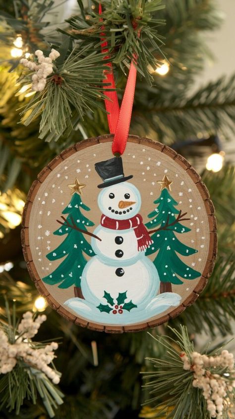 Snowman Painting On Wood Diy, Wooden Christmas Ornaments Painted, Round Wooden Ornaments Diy, Diy Wooden Ornaments Christmas, Wooden Snowmen Diy, Wood Snowman Ornaments, Painted Snowman Ornaments, Wooden Disc Ornaments, Hand Painted Ornaments Wooden