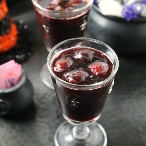 Toast Halloween With A Bewitching Blood Red Rum Punch Red Rum Punch, Black Cherry Juice, Halloween Punch Recipes, Halloween Treats To Make, Red Punch, Alcoholic Punch Recipes, Red Rum, Halloween Punch, Alcoholic Punch