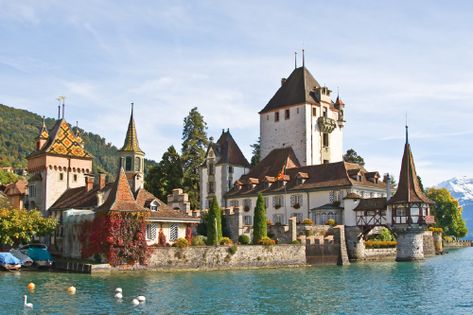 23 Most Beautiful Castles in Europe Thun Switzerland, Lake Thun, Wooden Castle, Switzerland Cities, Castle Tower, Fairytale Castle, Beautiful Castles, Swiss Alps, Medieval Castle