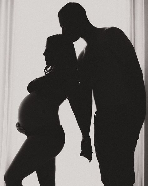 Pregnant Couple Silhouette, Shadow Maternity Shoot, Fun Maternity Shoot Ideas Couple, Maternity Picture Themes, Silohette Pregnancy Photos, Monochrome Maternity Shoot, Maternity Shilouette Pictures, Sultry Maternity Photos, Shadow Pregnancy Pictures