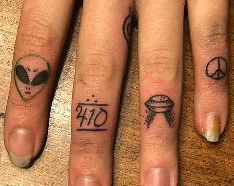 Micro Finger Tattoos done by Ellie Mac Ink in Roy, Utah. Includes alien, 410, spaceship and peace symbol. Space Themed Finger Tattoos, Alien Tattoo Finger, Alien Finger Tattoo, 410 Tattoo, Peace Tattoos, Tatted Men, Ellie And Mac, Finger Tats, Knuckle Tattoos