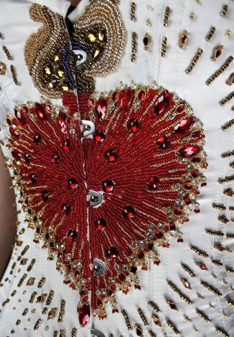 Sacred Heart Beaded, Sacred Heart Bead Embroidery, Sacred Heart Fashion, Sacred Heart Corset, Corset With Beads, Sacred Heart Dress, Heart Bead Embroidery, Hand Beaded Dress, Beaded Clothes Design