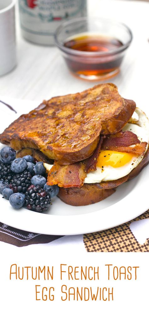 Autumn French Toast Egg Sandwich -- If you can't decide between sweet and savory for breakfast, try this Autumn French Toast Egg Sandwich. This delicious breakfast sandwich is made with fall spiced french toast, crispy bacon, and fried eggs... All slathered in maple syrup! | wearenotmartha.com #eggsandwich #eggs #frenchtoast #breakfast #brunch #breakfastsandwich #bacon #fall Sweet And Savory Breakfast Sandwich, French Toast Breakfast Sandwich, French Toast Egg Sandwich, French Toast Eggs And Bacon, Egg Toast Sandwich, French Toast Bacon, French Toast Bacon Egg Sandwich, Maple Waffle Breakfast Sandwich, Bacon Sandwich Recipes