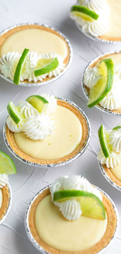 Craving something sweet? These Mini Key Lime Pies are fun to make and oh so easy too! A pint-sized version of my family’s favorite pie, these mini key lime pies are downright delicious! They’re sweet yet oh so tart, relying on a hearty dollop of whipped cream to tame the citrusy bite of lime. To make things oh so easy, I used pre-made 3-inch graham cracker crusts that were on sale (buy one get one free – whoo!!!!) at my local grocery store. Feel like making your own crusts? You can do that too! Mini Key Lime Pie, Key Lime Pies, Mini Key Lime Pies, Key Lime Tarts, Key Lime Desserts, Lime Tart, Lime Desserts, Lime Recipes, Favorite Pie