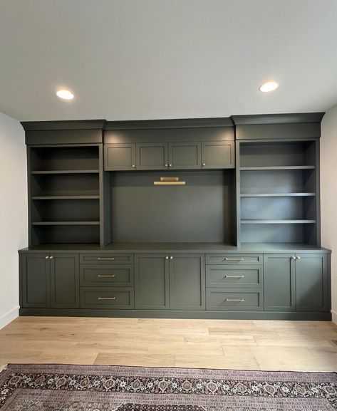 Office With Built Ins And Accent Wall, Built In Bookshelf Remodel, Wood Tone Built Ins, Green Built In Entertainment Center, White Built Ins With Dark Background, Reading Chair By Fireplace, Built In Bookcase With Cabinets, Tv Builtins Wall Units Modern, How To Build Bookcases Built Ins