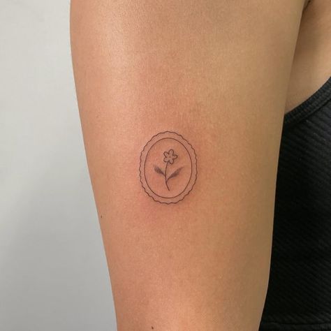 Flower In Circle Tattoo, Dainty Disco Ball Tattoo, Disco Ball Stamp Tattoo, Dainty Stamp Tattoo, Simple Fineline Tattoos, Cute Stamp Tattoo, Small Disco Ball Tattoo, Little Dainty Tattoos, Floral Stamp Tattoo