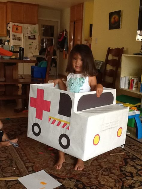 Ambulance box car Ambulance Box Car, Ambulance Activities For Preschool, Ambulance Craft, Healthy Food Activities For Preschool, Cardboard Box Car, Cardboard Car, Community Helpers Theme, Community Helpers Preschool, People Who Help Us