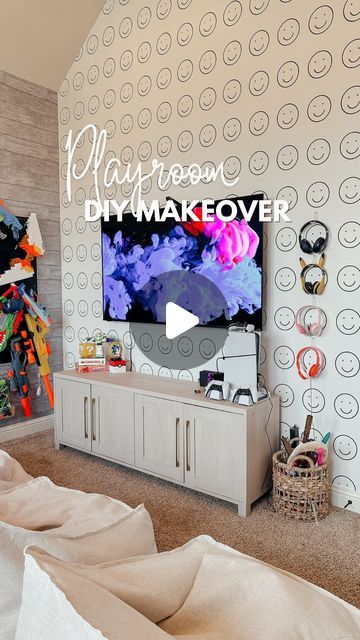 Katie Maynard on Instagram: "Comment SMILE and I’ll send you the links! 

I feel like I left y’all hanging with this project! The kids love the LED lights around the TV when we are playing games or movie night. And y’all the bean bags are SO comfortable! Loving this space and how far it’s come 💕

#playroom #playroomdecor #playroominspo #playroomideas #amazonhome #organization #playroomorganization #momhack #diyhome #peelandstickwallpaper #gaming #gameroom" Playroom/tv Room, Tv And Playroom Ideas, Kids Room Tv Wall, Tv Playroom Ideas, Playroom With Tv, Teen Playroom Ideas, Playroom Rock Wall, Teen Playroom, Kids Tv Room