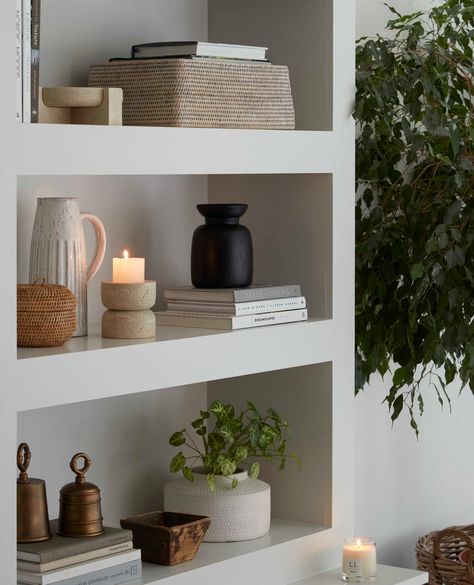 Undoubtedly, one of the most enjoyable aspects of home styling is curating your shelves. Embrace a fresh start by clearing the slate and artfully layering delightful, summery pieces that infuse your space with a light, airy charm. #shelfie #shelfstyling #bookshelfdecor #homedecor #interiordesign Masculine Shelf Styling, Bookshelf Styling Modern, Styled Shelves Living Room, Shelving Styling, Shelfie Decor, Minimalist Shelves Decor, Shelf Styling Living Room, Styling Shelf, Accessory Styling