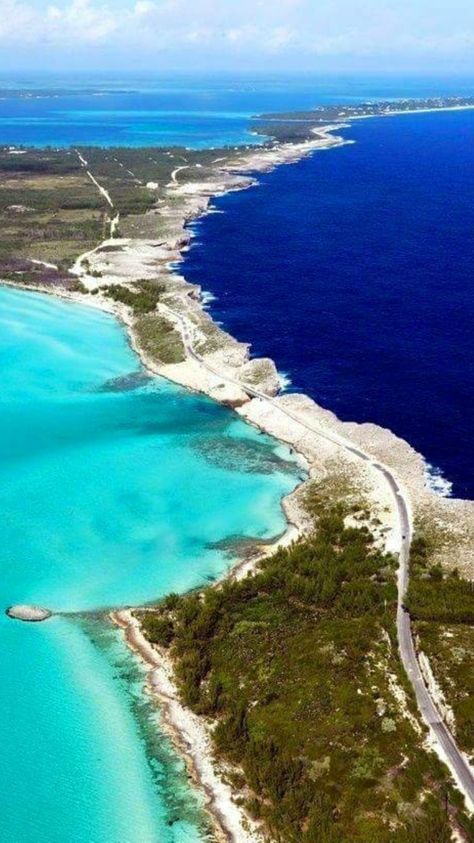 Eleuthera, an island in the Bahamas where the dark Atlantic Ocean meets the aqua Caribbean Sea. Eleuthera Bahamas, Halong Bay, The Bahamas, Atlantic Ocean, Beautiful Islands, Places Around The World, Aerial View, Wonderful Places, Vacation Spots