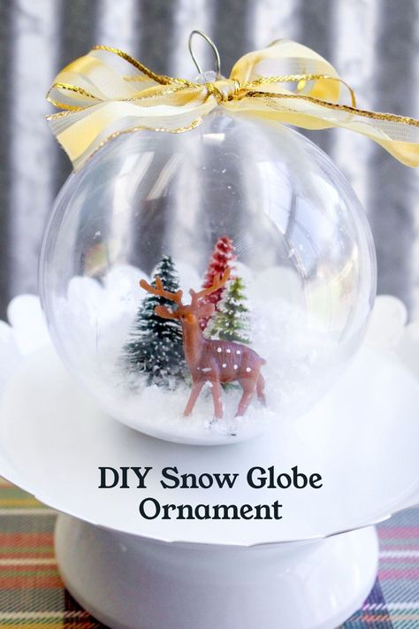 Craft your own magical winter wonderland with this DIY snow globe ornament. Perfect for Christmas tree decorating or unique gift-giving. Globe Diy, Globe Crafts, Diy Snow, Clear Glass Ornaments, Diy Snow Globe, Xmas Baubles, Globe Ornament, Christmas Snow Globes, Kids Ornaments