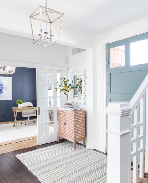 A beautiful spring entryway decorated using blue, greens and neutrals. I love this view looking into the office - painted Benjamin Moore Hale Navy. Light Blue Grey Paint, Interior Front Door, Gray Paint Colors, Blue Gray Paint Colors, Life On Virginia Street, Blue Gray Paint, Gray Paint, Design Blogs, Grey Paint Colors