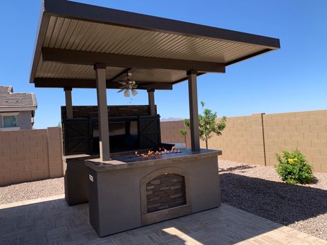 Kokomo Grills knows how to design and create the best outdoor kitchens and stand by the brand with a lifetime warranty! This BBQ Island has a Fire Pit 🔥 built into the bar seating area! 😱 a 32” 4 Burner 304 Stainless Steel Built In Kokomo BBQ Grill, outdoor rated Kokomo refridgerator and a 10’ x 10’ pergola! Pre built modular and ships Nationwide. Save thousands and call the factory Built In Bbq Grill, Grill Island, Fire Pit Landscaping, Bbq Island, Built In Bbq, Gas Bbq, Shade Canopy, Backyard Entertaining, Best Bbq