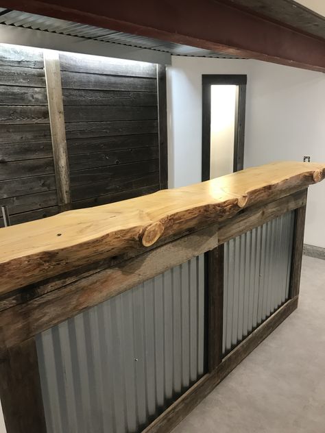 Bar with live edge Live Edge Checkout Counter, Cedar Bar Top, Rustic Bar Wall Ideas, Bar Fronts Ideas, Love Edge Bar Top, Turn Cabinet Into Bar, Live Edge Bars, Live Edge Bar Ideas, Bar Front Ideas