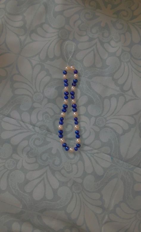 pearl phone charm|white and blue phone charm Blue Phone Charm, Pearl Phone Charm, Phone Bracelet, Bracelet Aesthetic, Aesthetic Blue, Phone Charm, Beaded Bracelets, Bracelet, Beads