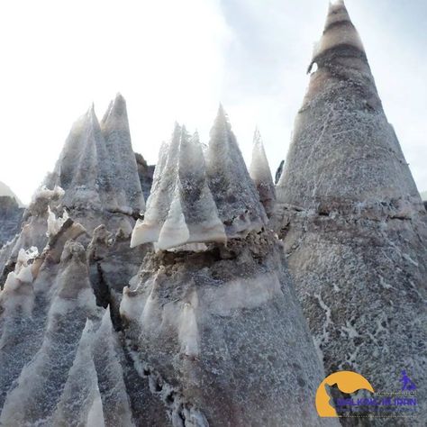 The Bastak Salt Domes, also known as Gonbad Namaki in Farsi, are a fascinating geological formation located near the city of Bastak in Hormozgan Province, Iran. These domes are visually striking and a popular tourist destination. These domes are formed through a process of salt diapirism. Over millions of years, thick layers of salt deposit built up underground. Over time, due to the buoyant nature of salt relative to the surrounding rock, the salt pushed its way upwards through the rock lay... Salt Mountain, Iran Tourism, Visit Iran, Thick Layers, Moon Photography, Natural Phenomena, Mountain Range, Oh The Places Youll Go, Tourist Destinations