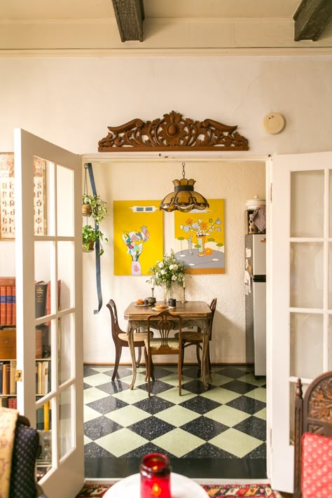 From the living room the French doors open up into the dining room/kitchen. Their whole dining set was found on Craigslist Checkered Floor, Dining Nook, Tile Flooring, Skyfall, Small Studio, Apartment Inspiration, Easy Home Decor, Design Case, Cheap Home Decor