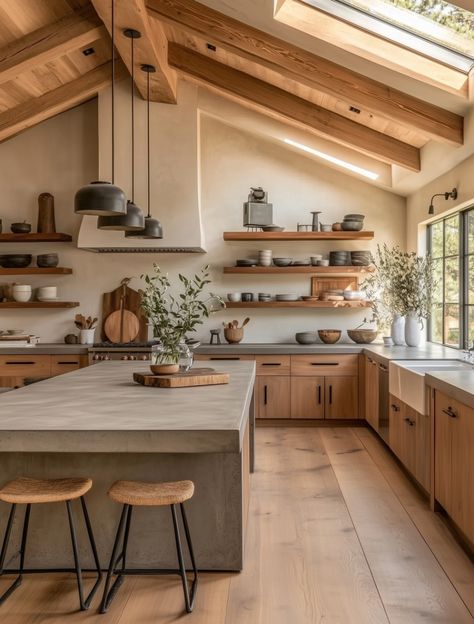 This stunning kitchen, nestled in an attic, is a perfect blend of Japanese minimalism and modern design. The concrete island, open shelving, and skylight create a clean and airy atmosphere. The minimalist aesthetic, inspired by Japanese design principles, is evident in the clean lines, neutral colors, and functional layout.  #MinimalistKitchen #JapaneseDesign #LoftKitchen #InteriorDesign #HomeDecor #KitchenInspiration #ConcreteIsland #OpenShelving #Skylight Korean Inspired Kitchen, Japan Inspired Kitchen, Kitchen Design New Zealand, Japandi Open Kitchen, Japan Style Kitchen, Kitchen Design Japandi, Japanese Open Kitchen, Japanese Modern House Minimalism, Japanese Interior Design Kitchen