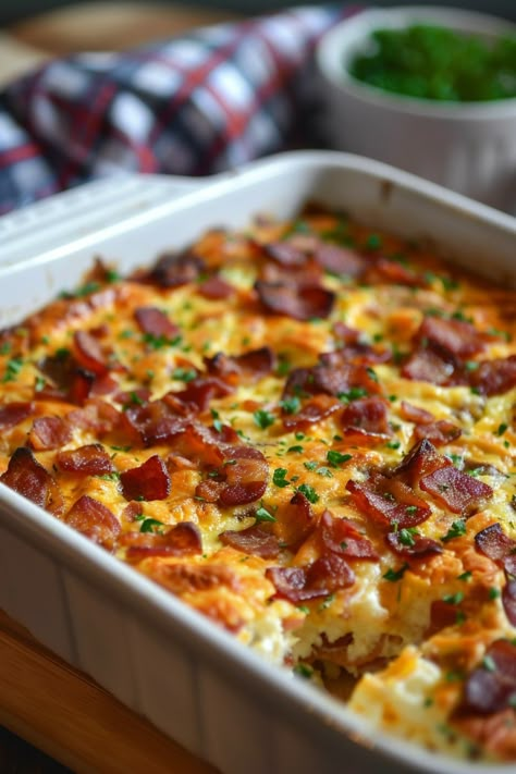 Looking for a delicious breakfast idea? Try this mouthwatering bacon breakfast casserole recipe that the whole family will love. It's easy to make and perfect for special mornings or holidays. Packed with savory flavors, this casserole is sure to become a favorite in your home. Get ready to impress your guests with this scrumptious dish! Why settle for plain old breakfast when you can enjoy the savory goodness of bacon combined with cheesy, fluffy eggs baked to perfection? Cheesy Baked Eggs For One, Breakfast For Dinner Casserole, Savory Baked Breakfast, Ward Breakfast Ideas, Brunch Ideas With Bacon, Breakfast Casserole Savory, Potluck Egg Dish Breakfast, Breakfast Bombshell Recipes, Breakfast Bacon Casserole Recipes